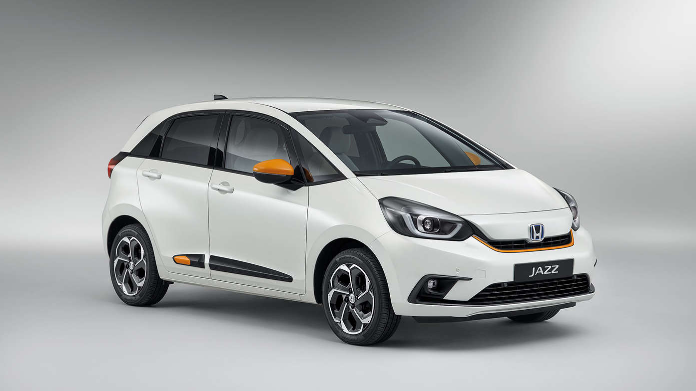 Taffta White Honda Jazz Hybrid in Studio with Functional Fun Pack Orange/White