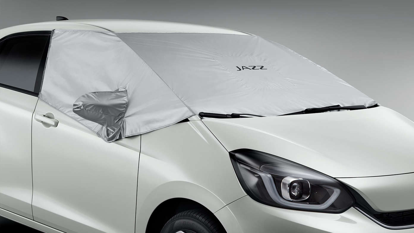 Close up of Honda Jazz Hybrid windshield cover.