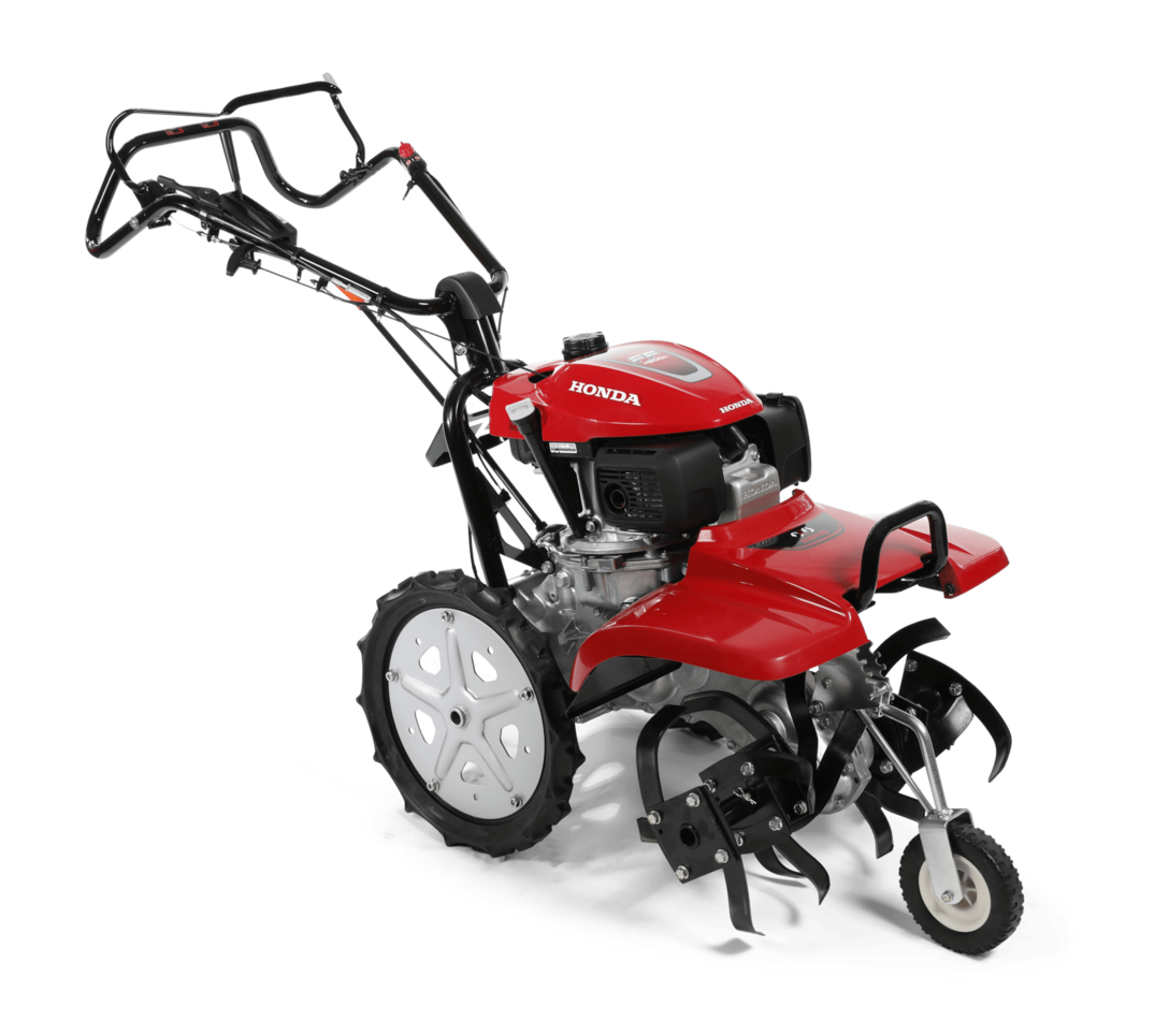 Motozappa controrotante, utilizzata da un operatore, luogo di utilizzo: giardino.