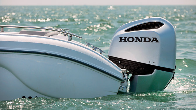 Side facing boat with Honda marine engine.