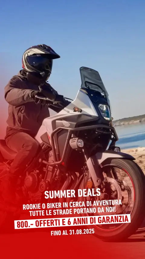 Honda NX500 guidata lungo una strada costiera